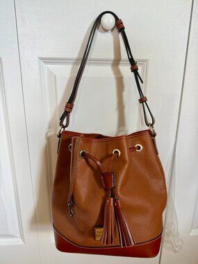 Dooney & Bourke Brown Crossbody Bag with Adjustable Strap and Silver Hardware